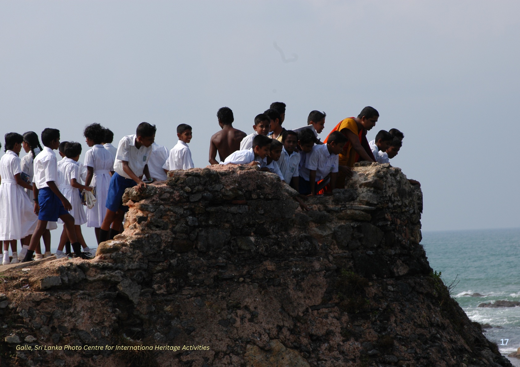 Young people exploring a coastal heritage site in Galle, Sri Lanka